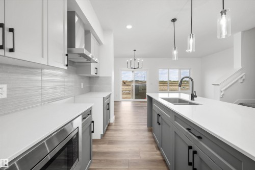 2035 Callihoo Link Sw, Edmonton, AB - Indoor Photo Showing Kitchen With Double Sink With Upgraded Kitchen