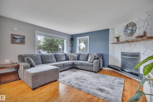 5116 47 Avenue, Leduc, AB - Indoor Photo Showing Living Room With Fireplace