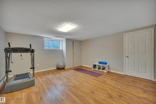 5116 47 Avenue, Leduc, AB - Indoor Photo Showing Gym Room