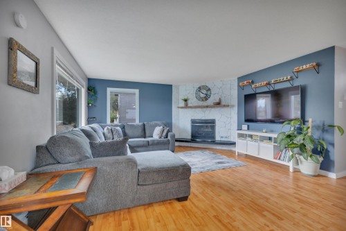5116 47 Avenue, Leduc, AB - Indoor Photo Showing Living Room With Fireplace