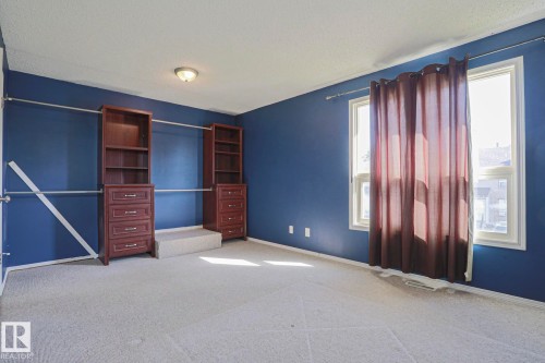 Built-in cabinetry with shelving and drawers - #45 1651 46 St Nw, Edmonton, AB - Indoor