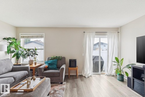 #22 230 Edwards Dr Sw, Edmonton, AB - Indoor Photo Showing Living Room