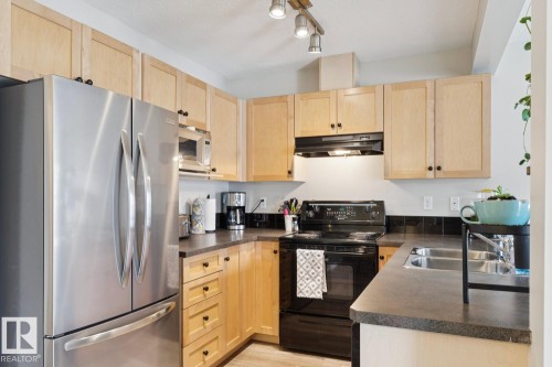 #22 230 Edwards Dr Sw, Edmonton, AB - Indoor Photo Showing Kitchen With Double Sink