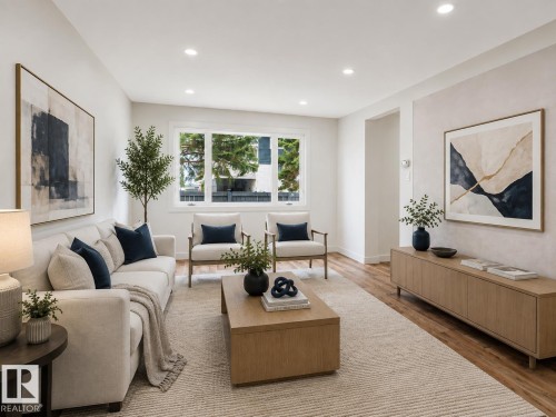 Recessed lighting illuminates the living area with wood-finish flooring and a large window - 224 Callingwood Two Two Nw, Edmonton, AB - Indoor Photo Showing Living Room