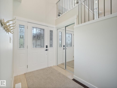 Soaring ceilings, fresh paint and a large closet - 30 Shorewood Crescent, Leduc, AB - Indoor Photo Showing Other Room