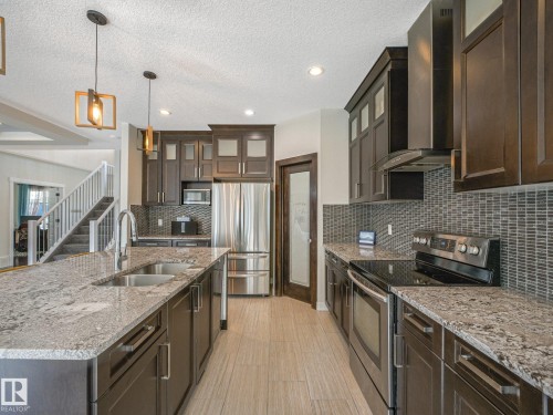 30 Shorewood Crescent, Leduc, AB - Indoor Photo Showing Kitchen With Double Sink With Upgraded Kitchen
