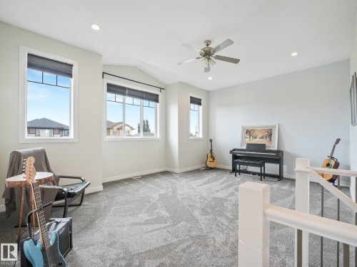 Amazing space for Music or Movie nights! Lots of windows, fresh paint and new carpets - 30 Shorewood Crescent, Leduc, AB - Indoor