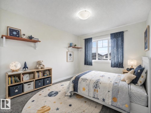 (virtually staged) - 30 Shorewood Crescent, Leduc, AB - Indoor Photo Showing Bedroom