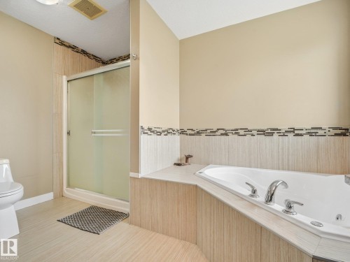 large shower and jacuzzi tub - 30 Shorewood Crescent, Leduc, AB - Indoor Photo Showing Bathroom