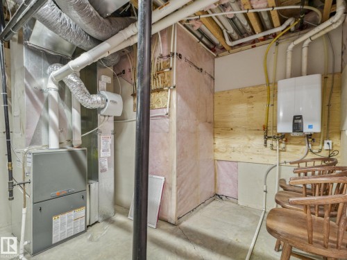 New hot water on demand! - 30 Shorewood Crescent, Leduc, AB - Indoor Photo Showing Basement