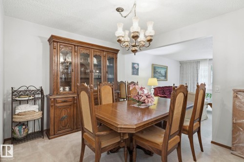 Open archway connecting to an additional room - 7 Graham Avenue, St. Albert, AB - Indoor Photo Showing Dining Room