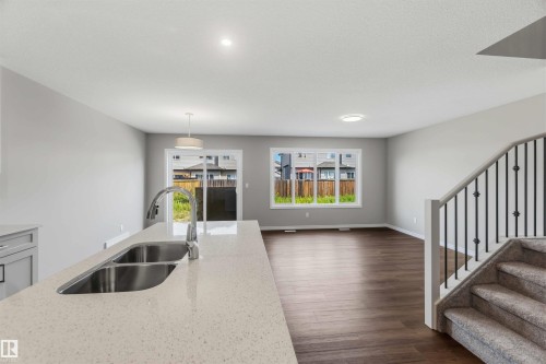 1188 South Creek Wynd, Stony Plain, AB - Indoor Photo Showing Kitchen With Double Sink