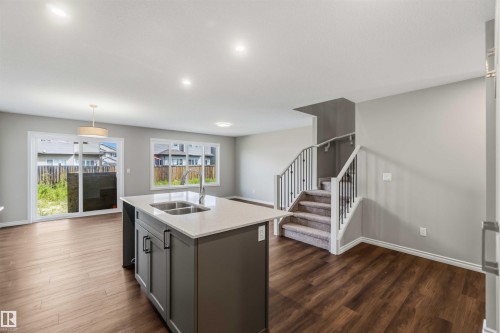 1188 South Creek Wynd, Stony Plain, AB - Indoor Photo Showing Kitchen With Double Sink