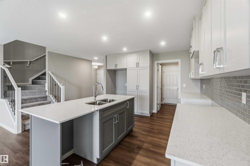 1188 South Creek Wynd, Stony Plain, AB - Indoor Photo Showing Kitchen With Double Sink