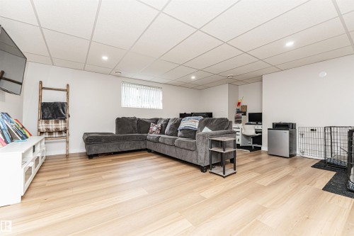Recessed lighting, light wood-finish flooring, white walls, and a window with blinds - 4521 29 Avenue Nw, Edmonton, AB - Indoor