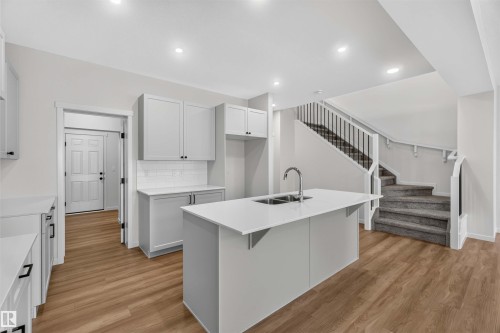 5 Emerson Landing, Spruce Grove, AB - Indoor Photo Showing Kitchen With Double Sink