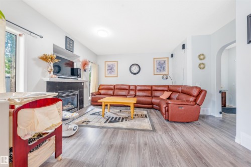 37 Birchmont Crescent, Leduc, AB - Indoor Photo Showing Living Room With Fireplace