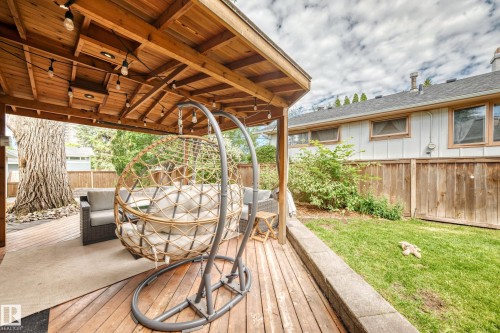 Covered wood deck with recessed lighting and string lights - 16406 87A Avenue Nw, Edmonton, AB - Outdoor With Deck Patio Veranda With Exterior