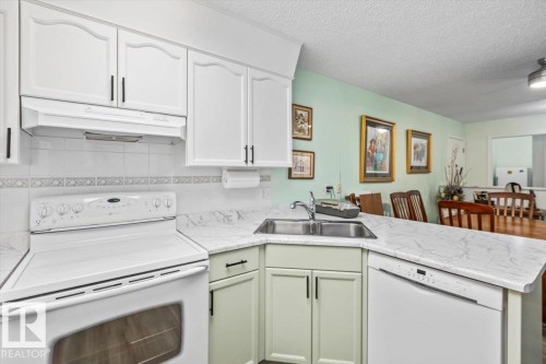 #307 45 Gervais Rd, St. Albert, AB - Indoor Photo Showing Kitchen With Double Sink