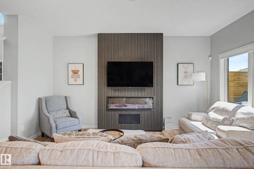 97 Garneau Gate, Spruce Grove, AB - Indoor Photo Showing Living Room With Fireplace