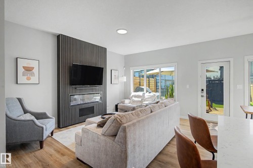 97 Garneau Gate, Spruce Grove, AB - Indoor Photo Showing Living Room With Fireplace