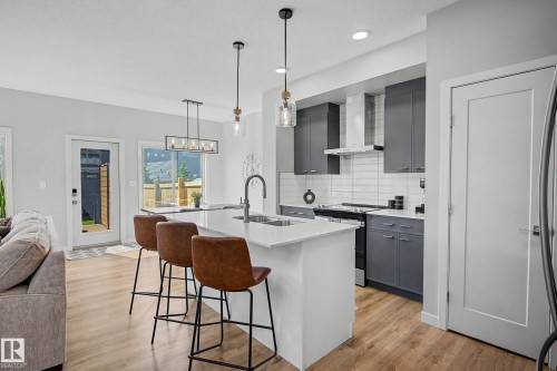 97 Garneau Gate, Spruce Grove, AB - Indoor Photo Showing Kitchen With Double Sink With Upgraded Kitchen