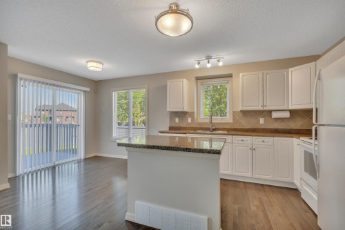 #1 5101 Soleil Bv, Beaumont, AB - Indoor Photo Showing Kitchen