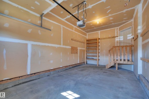 #1 5101 Soleil Bv, Beaumont, AB - Indoor Photo Showing Garage
