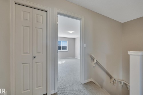 #1 5101 Soleil Bv, Beaumont, AB - Indoor Photo Showing Other Room