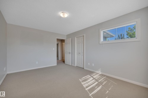 #1 5101 Soleil Bv, Beaumont, AB - Indoor Photo Showing Other Room