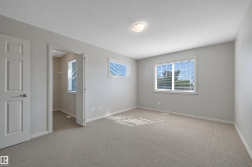 #1 5101 Soleil Bv, Beaumont, AB - Indoor Photo Showing Other Room