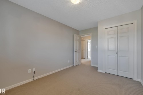 #1 5101 Soleil Bv, Beaumont, AB - Indoor Photo Showing Other Room