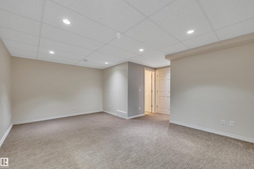 #1 5101 Soleil Bv, Beaumont, AB - Indoor Photo Showing Other Room