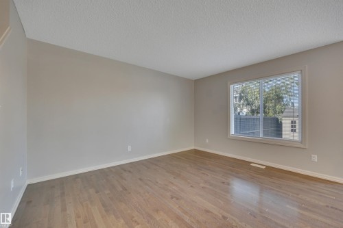#1 5101 Soleil Bv, Beaumont, AB - Indoor Photo Showing Other Room