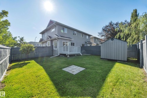 #1 5101 Soleil Bv, Beaumont, AB - Outdoor With Backyard