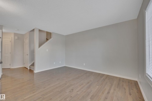 #1 5101 Soleil Bv, Beaumont, AB - Indoor Photo Showing Other Room