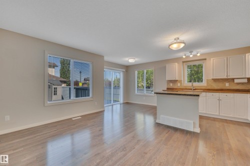 #1 5101 Soleil Bv, Beaumont, AB - Indoor Photo Showing Kitchen
