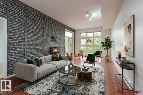 #321 10407 122 St Nw, Edmonton, AB - Indoor Photo Showing Living Room With Fireplace