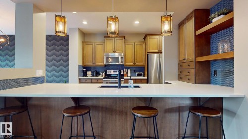 223 Hawks Ridge Boulevard Nw, Edmonton, AB - Indoor Photo Showing Kitchen With Upgraded Kitchen