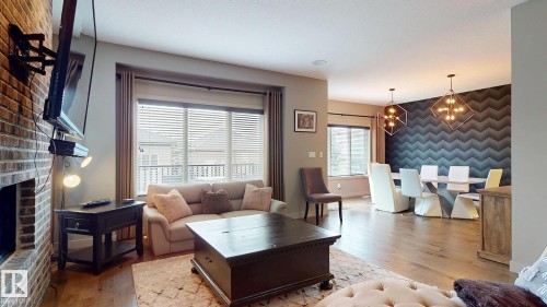 223 Hawks Ridge Boulevard Nw, Edmonton, AB - Indoor Photo Showing Living Room With Fireplace