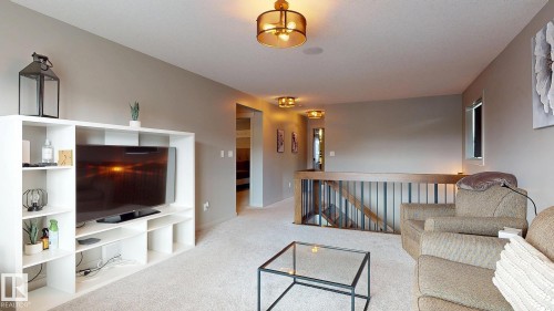 223 Hawks Ridge Boulevard Nw, Edmonton, AB - Indoor Photo Showing Living Room