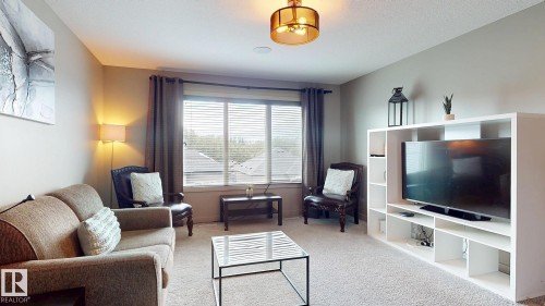 223 Hawks Ridge Boulevard Nw, Edmonton, AB - Indoor Photo Showing Living Room
