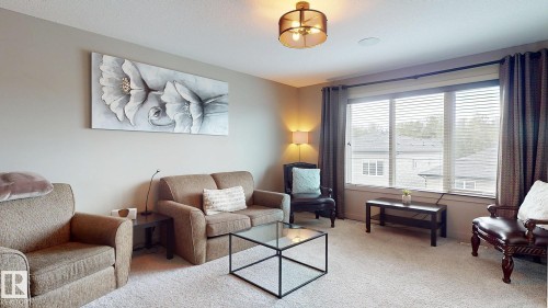 223 Hawks Ridge Boulevard Nw, Edmonton, AB - Indoor Photo Showing Living Room