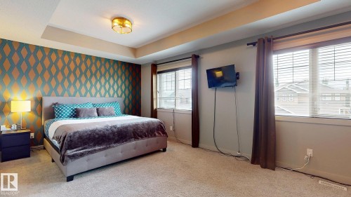 223 Hawks Ridge Boulevard Nw, Edmonton, AB - Indoor Photo Showing Bedroom