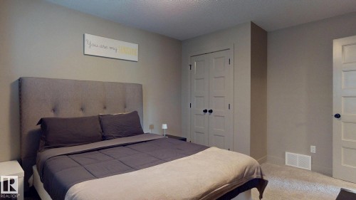 223 Hawks Ridge Boulevard Nw, Edmonton, AB - Indoor Photo Showing Bedroom