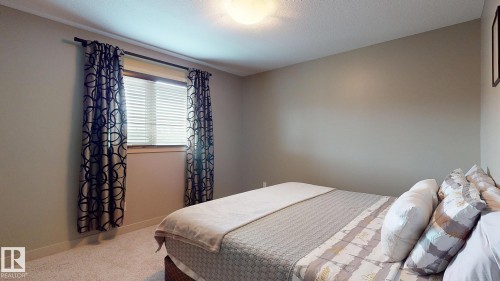 223 Hawks Ridge Boulevard Nw, Edmonton, AB - Indoor Photo Showing Bedroom