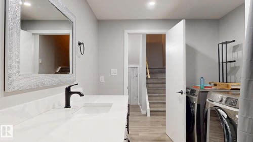 223 Hawks Ridge Boulevard Nw, Edmonton, AB - Indoor Photo Showing Laundry Room