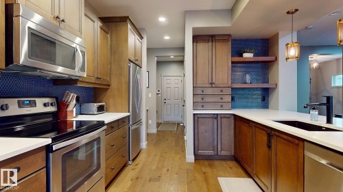 223 Hawks Ridge Boulevard Nw, Edmonton, AB - Indoor Photo Showing Kitchen With Upgraded Kitchen