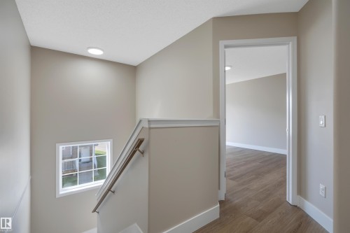 #23 5102 30 Av, Beaumont, AB - Indoor Photo Showing Other Room