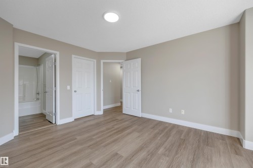 #23 5102 30 Av, Beaumont, AB - Indoor Photo Showing Other Room